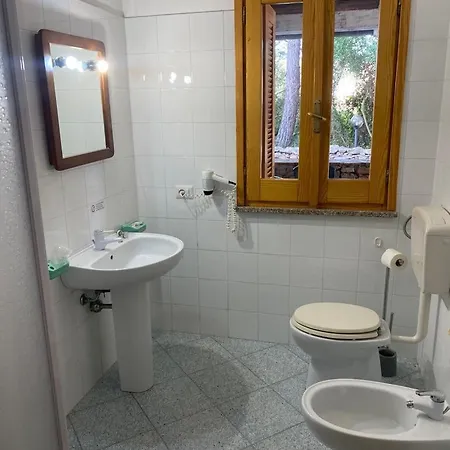 Le Stanze Del Mare Aparthotel Golfo Aranci Quarto foto
